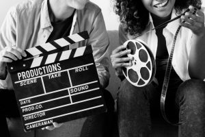 young-women-with-movie-film-reel